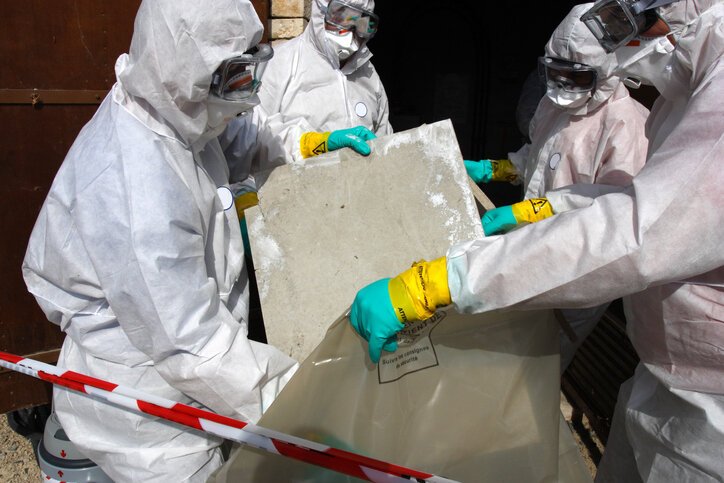 Removing materials containing some asbestos