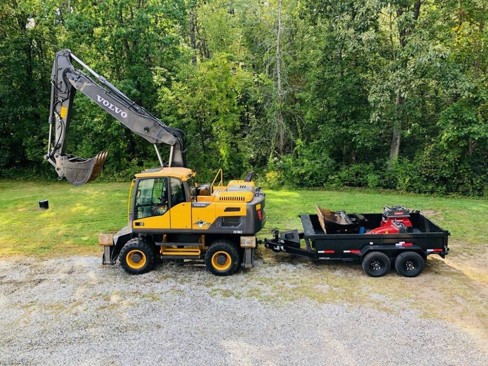 EnviroVantage Volvo Wheeled Excavator with Trailer of Attachments